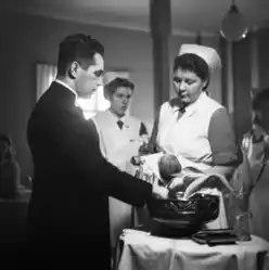 Children being baptised at the Kätilöopisto Maternity Hospital, Finland, 1947