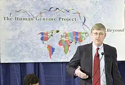 Francis Collins announcing the successful completion of the Human Genome Project