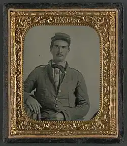 Corporal L. Purnell of Co. I, 11th Mississippi Infantry Regiment, in uniform. Photo taken between 1861 and 1865.