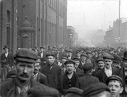 Men leaving a factory