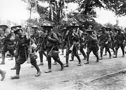 Australian troops marching along a road, France, during World War I