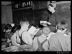 Mennonite teacher holding class in one-room, eight grade school house. Hinkletown, Pennsylvania, 1942.