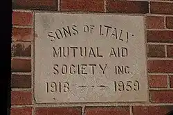 Inscribed stone in the Italian Society of Middletown, Connecticut.