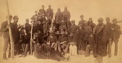Buffalo Soldiers of the 25th Infantry, some wearing buffalo robes, Ft. Keogh, Montana