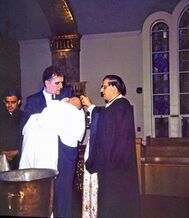 Greek baptism ceremony. Photo from the personal collection of Carol Kostakos Petranek; used with permission.