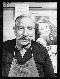 Italian-American shoe repair man. 1943