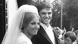 Photograph of Virpi Miettinen and Caesar von Walzel after their wedding ceremony in front of Porvoo Cathedral.